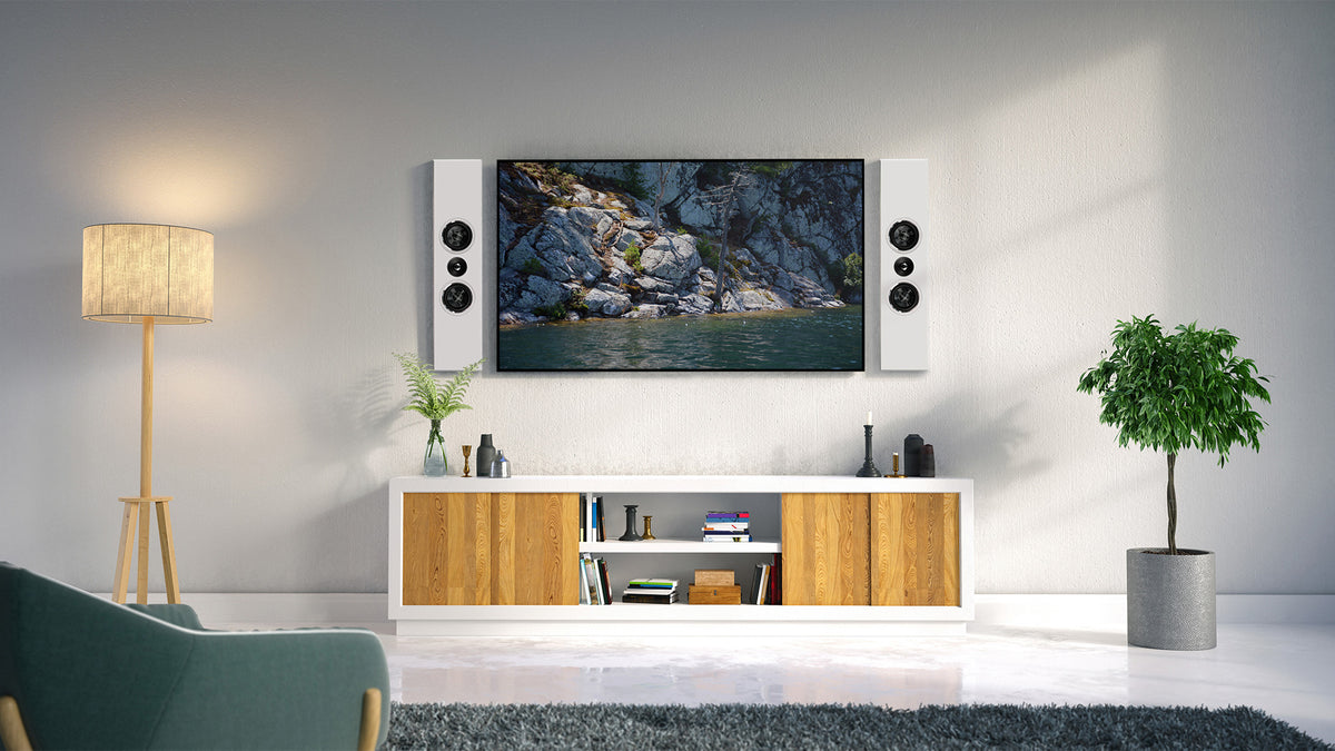 PWM speakers flanking a TV mounted on the wall